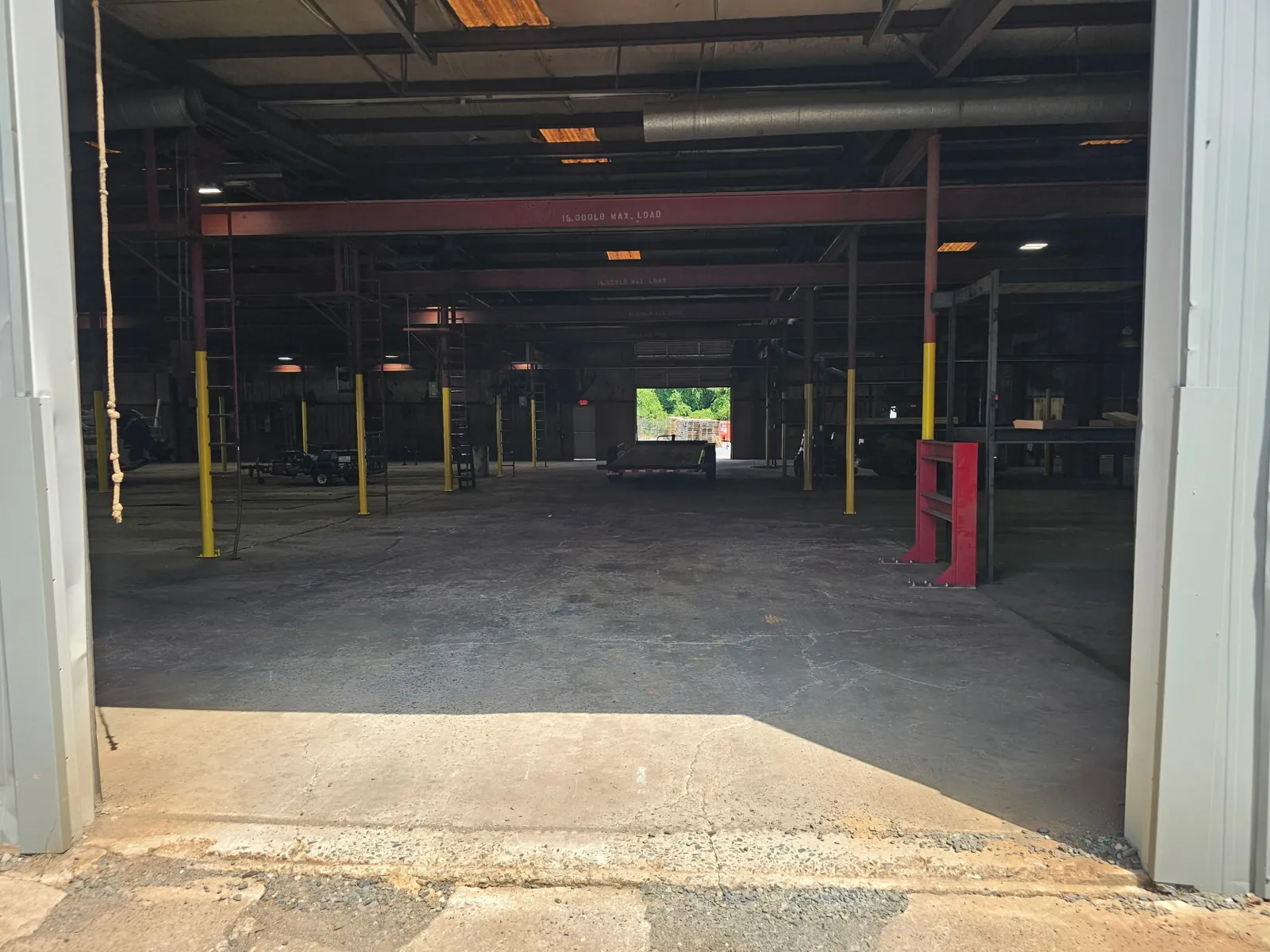 View through the roll-up door into the warehouse